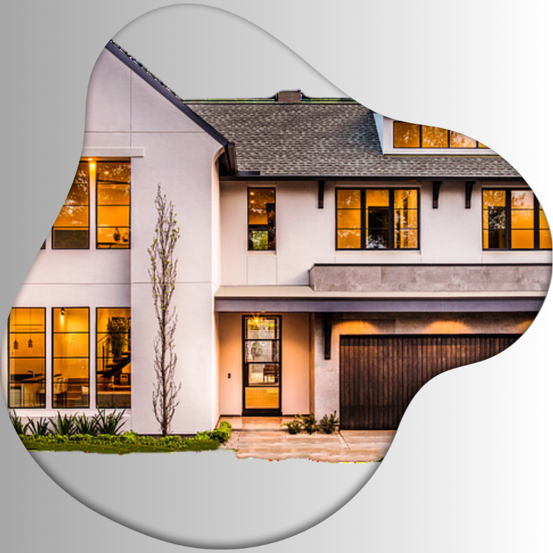 Modern two-story house exterior with large windows, warm interior lighting, and wooden garage door