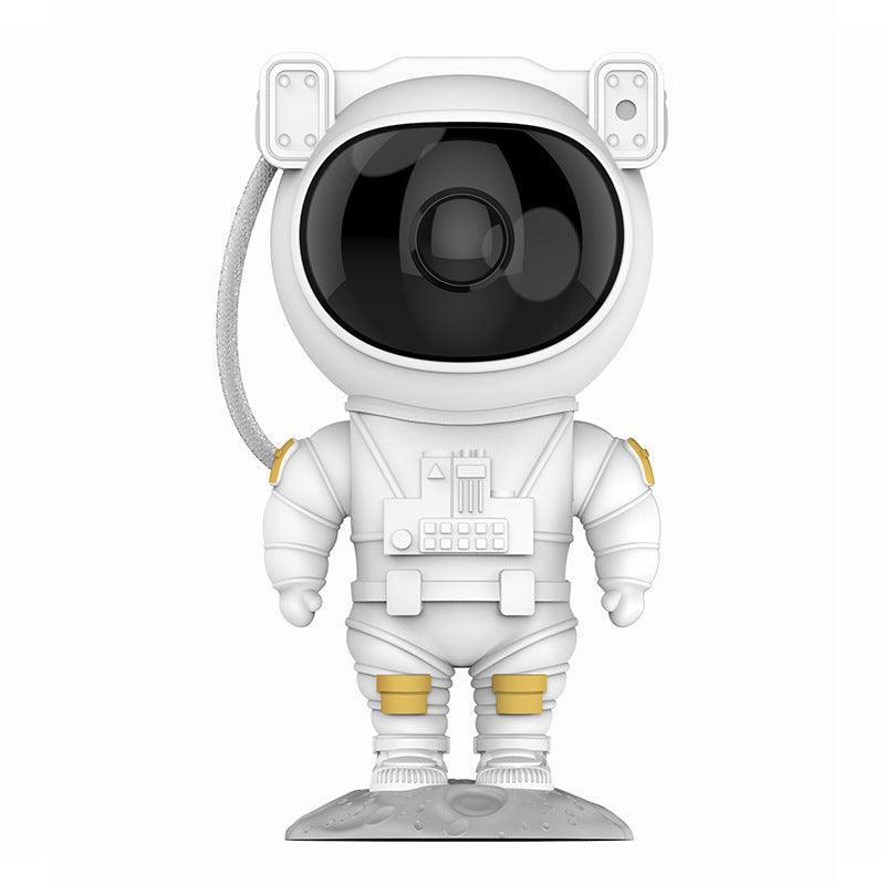 White astronaut figure with large black visor helmet and gold knee and shoulder accents standing on textured gray base
