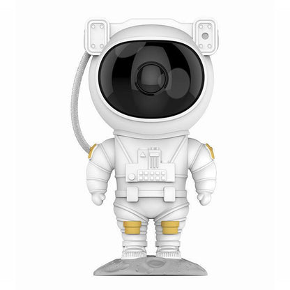 White astronaut figure with large black visor helmet and gold knee and shoulder accents standing on textured gray base